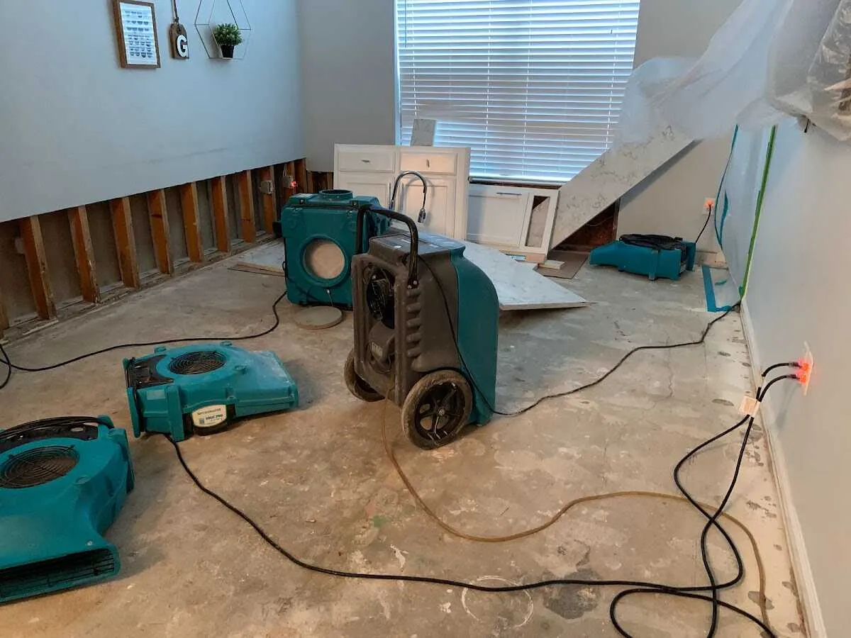 Dehumidifier in flood-cut room for Water Damage Restoration in Idabel